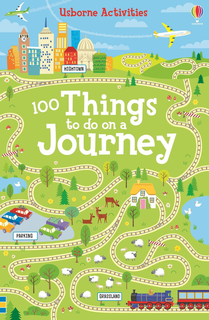 Brightly illustrated book cover with winding tracks, a city skyline, airplanes, and animals in a green landscape.