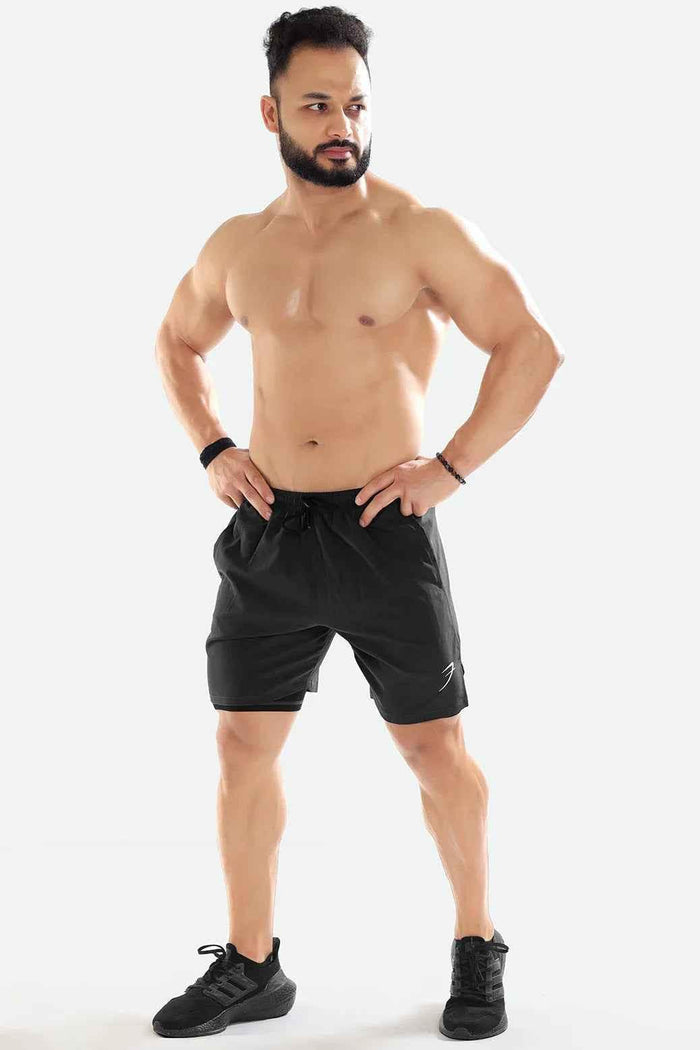 Dark grey 2-in-1 compression shorts by Fuaark Nz featuring a sleek design and comfortable fit for active wear.