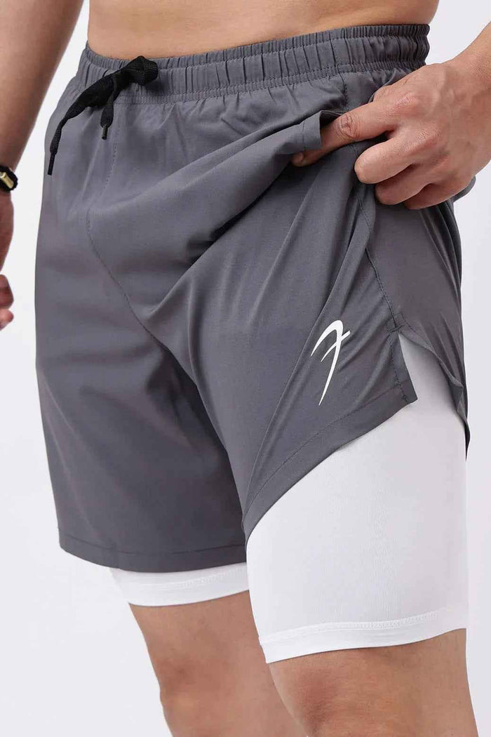 Fuaark Nz 2-in-1 compression shorts in grey with white accents, fitted design for athletic performance and comfort.