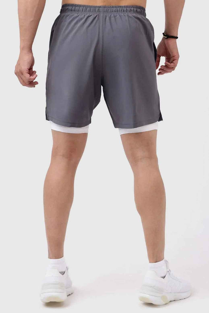 Fuaark Nz 2-in-1 compression shorts in grey with white accents, featuring a snug fit and breathable fabric for active wear.