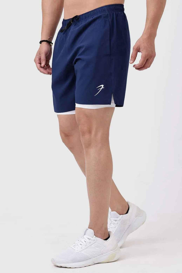 Navy 2-in-1 compression shorts by Fuaark Nz, featuring a snug fit and stretchy fabric for active wear and support.
