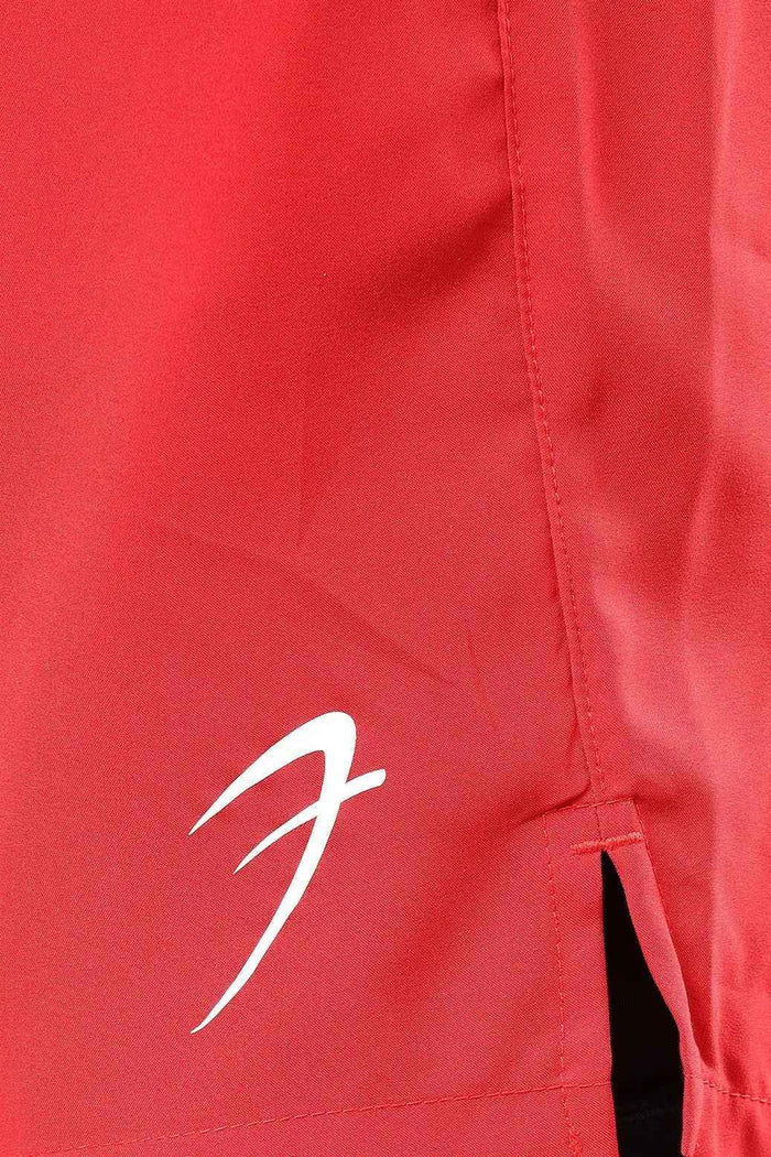 Red 2-in-1 compression shorts by Fuaark Nz featuring a snug fit and athletic design for enhanced performance and comfort.