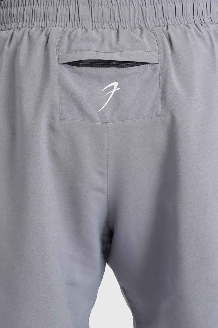 Fuaark Nz 2-in-1 mesh shorts in foggy grey with white accents, featuring a breathable design and athletic fit.