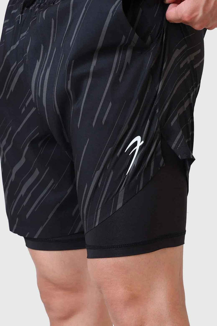 Black 2-in-1 printed compression shorts by Fuaark Nz, featuring a sleek design and comfortable fit for active wear.