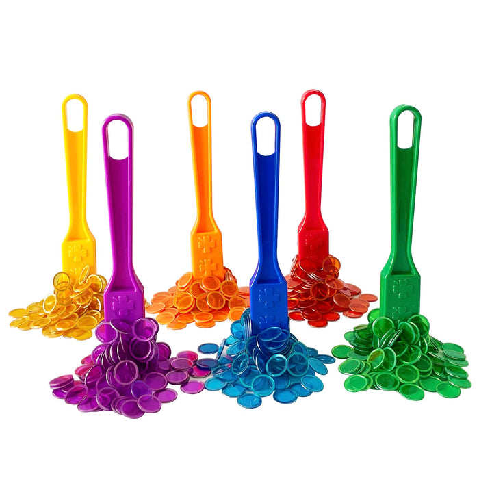 Six colorful magnetic wands in yellow, purple, orange, blue, red, and green attracting matching translucent round chips.
