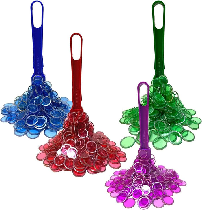 Four magnetic wands in blue, red, green, and purple each attracting a cluster of matching translucent circular chips.