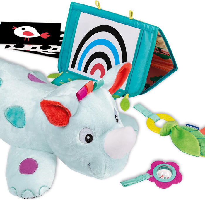 Plush light blue rhino with colorful spots and a turquoise activity board showing high-contrast rainbow patterns.