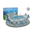 Assembled light blue and silver 3D stadium puzzle with masts, shown next to its blue Manchester City branded box.