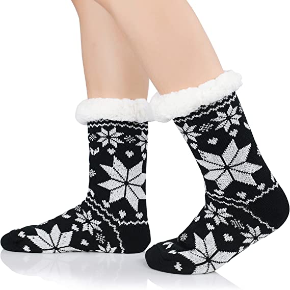 Four pairs of dealonlinenz women's fuzzy winter slippers with soft, warm fabric and non-slip grippers for cozy comfort.