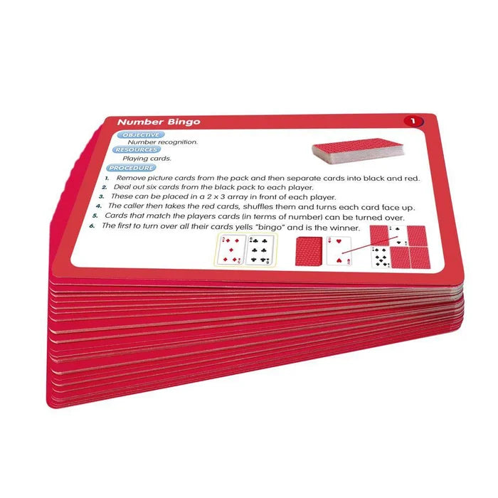 Stack of red cards; the top card features Number Bingo instructions and illustrations of playing cards.