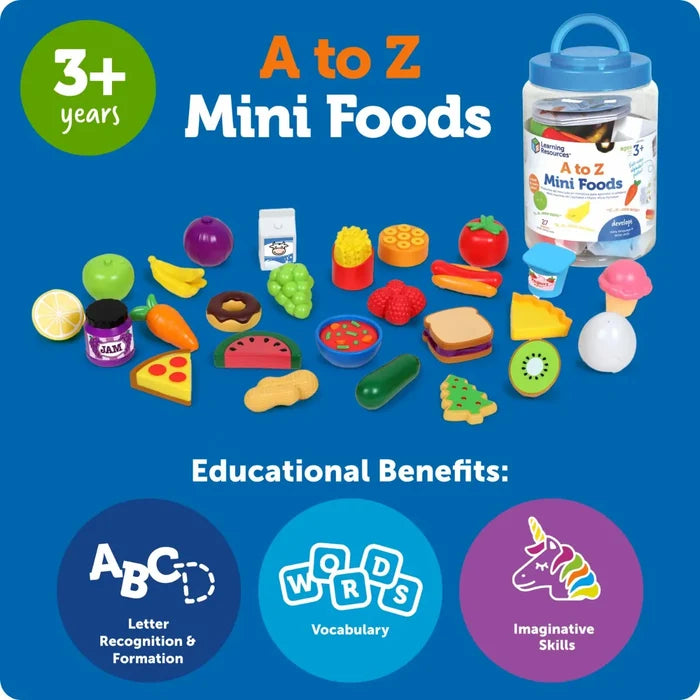 Colorful toy food pieces including fruits and vegetables spread on a blue background next to their storage jar.