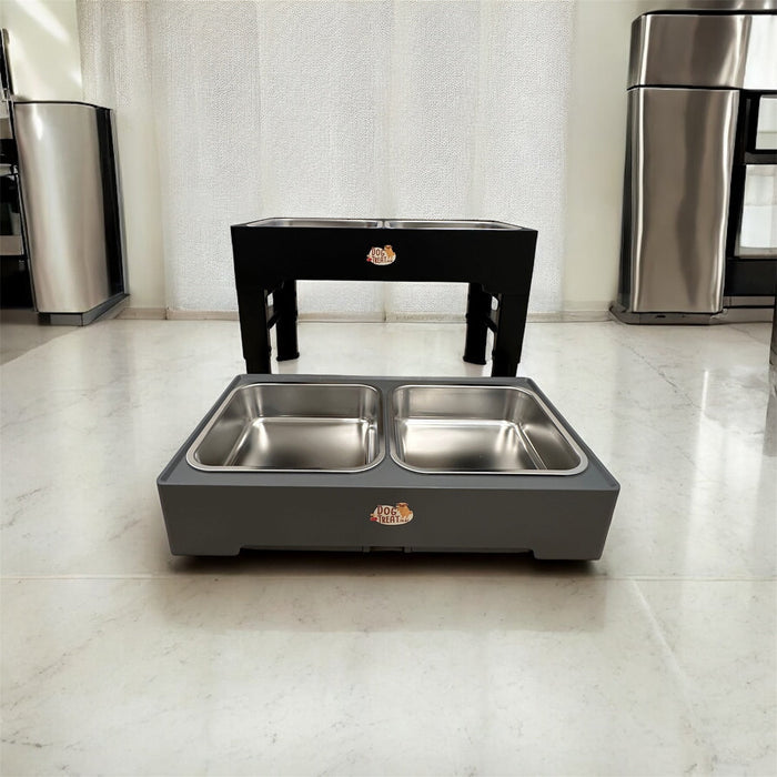Adjustable dog bowl by DogTreatNZ with a stainless steel bowl and adjustable stand, set on a wooden surface.
