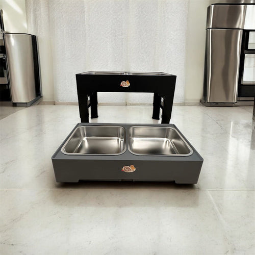 Adjustable dog bowl by DogTreatNZ with a stainless steel bowl and adjustable stand, set on a wooden surface.