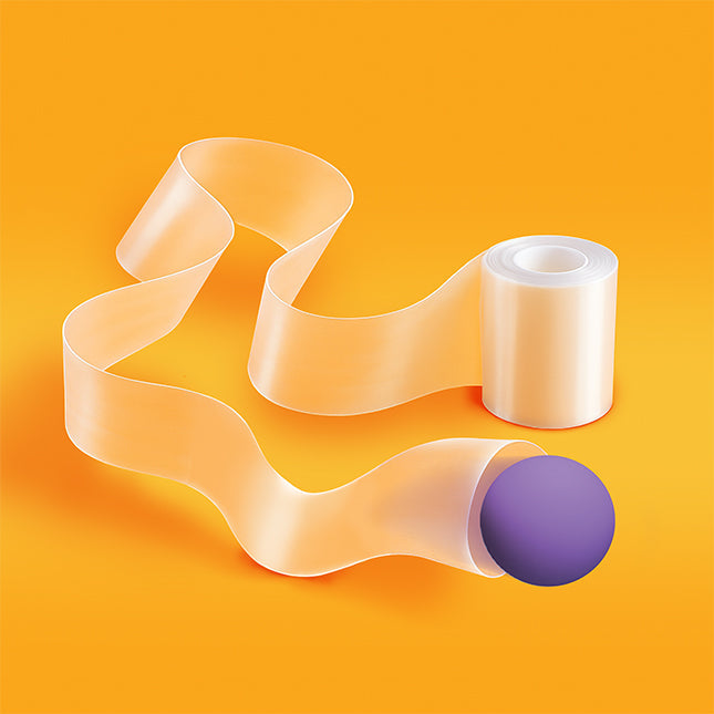 Translucent peach flexible tube unspooling from a roll with a purple ball inside the end on an orange background.