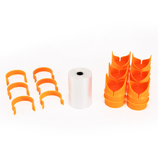 Six orange C-clips, eight orange stackable tube connectors, and a roll of clear plastic tubing.