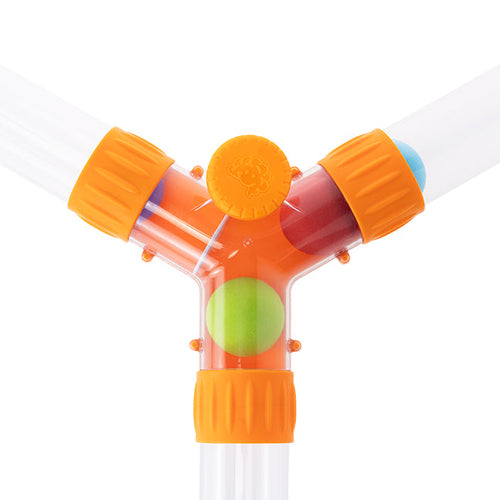 Clear Y-shaped air diverter with orange dial and caps, featuring a green foam ball inside.