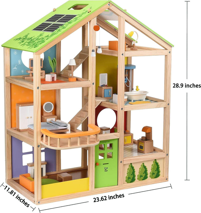 Three-story wooden dollhouse with furniture, a green solar-panel roof, and dimensions labeled in inches.