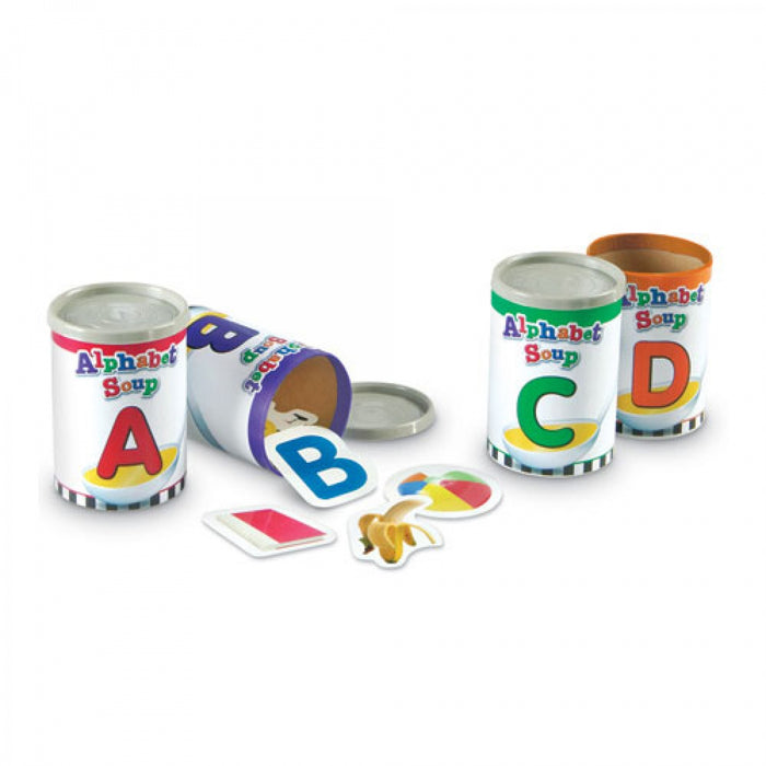 Four colorful toy soup cans labeled A-D with sorting cards of a letter B, banana, and beach ball spilling out.