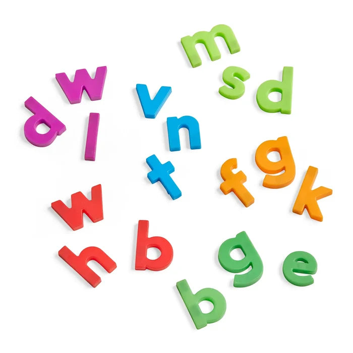 Colorful plastic lowercase and uppercase letters in various colors scattered on a white background.