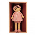 Soft rag doll with brown hair wearing a pink muslin dress and headband, presented in a pink and red gift box.
