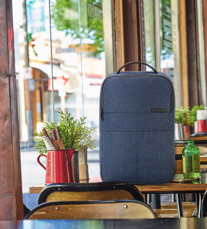 ECOTREK American Tourister GUAM Series backpack with multiple compartments and adjustable straps, designed for travel and daily use.