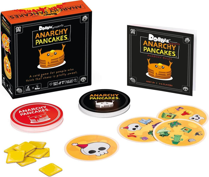 Black game box with orange pancake mascot, round cards with colorful icons, yellow star tokens, and a rulebook.