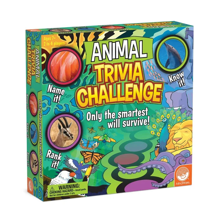 Vibrant board game box featuring photos of a dolphin and gazelle with colorful illustrations of a lion and peacock.