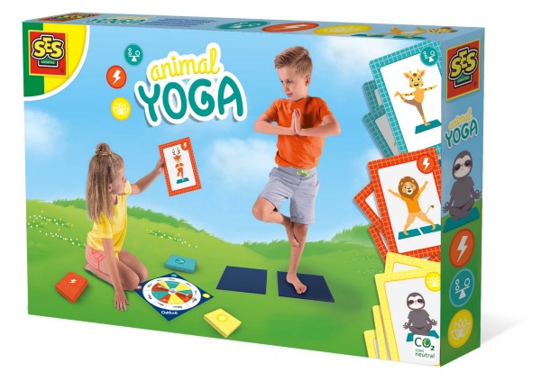 SES Animal Yoga game box showing children using animal pose cards, yoga mats, and a spinner on a grassy field.