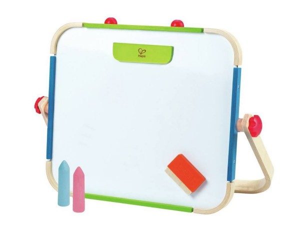 Wooden tabletop art easel with whiteboard, blue and green trim, red knobs, blue and pink chalk, and orange eraser.