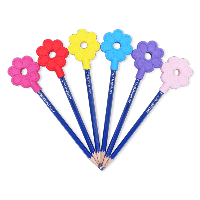 Six blue pencils fanned out with flower-shaped chewable toppers in pink, red, yellow, blue, purple, and light pink.