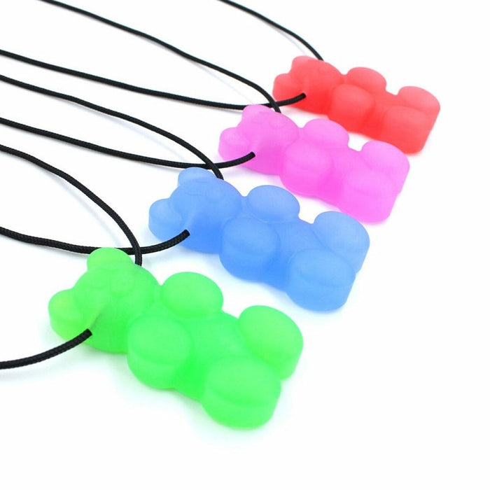 Four bear-shaped silicone pendants in red, pink, blue, and green on thin black cords.
