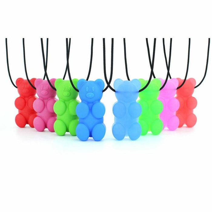 Eight gummy bear-shaped silicone chew pendants in vibrant colors hanging from thin black cords.