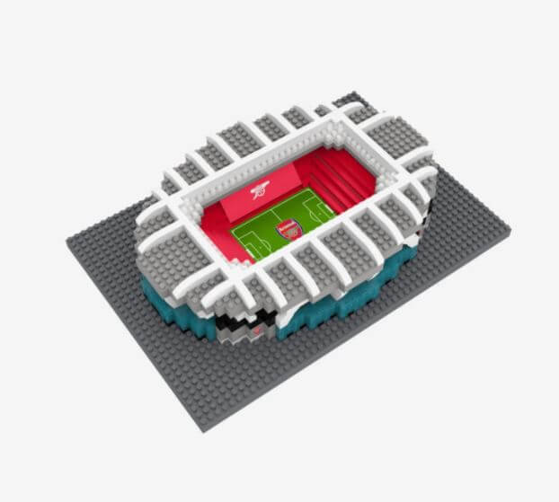 Building block stadium with red tiered seating, green pitch, and white structural frame on a grey baseplate.