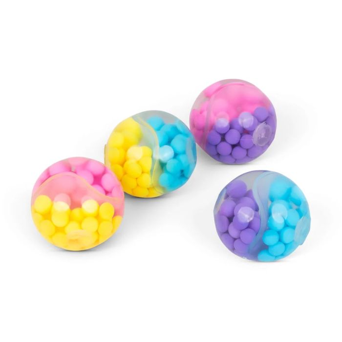 Four transparent squish balls filled with colorful two-tone beads in pink, yellow, blue, and purple.