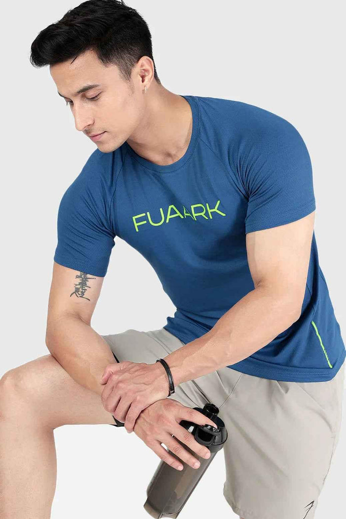 Fuaark Nz Aura Textured Teal T-shirt displayed flat, showcasing its unique textured fabric and casual fit.