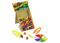 Slanted wood-look stand with colorful plastic fruit, two pairs of large tweezers, and a numbered color game spinner.