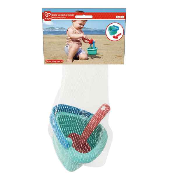Teal bucket with blue handle and red spade in a mesh bag with a cardboard header showing a baby playing at the beach.