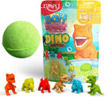 Green bath bomb sphere next to colorful dinosaur-themed packaging and six small dinosaur figurines in various colors.