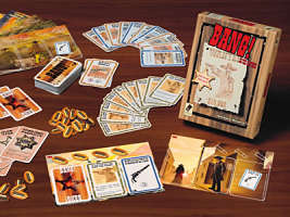 Western card game with wood-grain box, red BANG! logo, gold bullet tokens, and illustrated playing cards on a table.