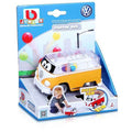 Yellow and white toy VW bus with colorful balls inside a clear roof, displayed in a blue BBJunior retail box.