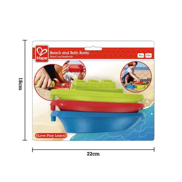 Three green, red, and blue plastic toy boats stacked in a 22x18cm package with photos of beach play.
