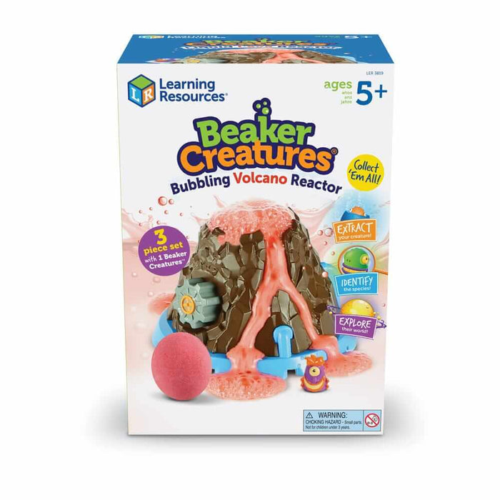 Box for a brown toy volcano with bubbling orange foam, a pink round pod, and small colorful plastic monster figures.