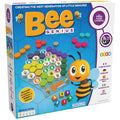 Blue game box featuring a hexagonal puzzle board with colorful pieces, a cartoon bee character, and numbered dice.