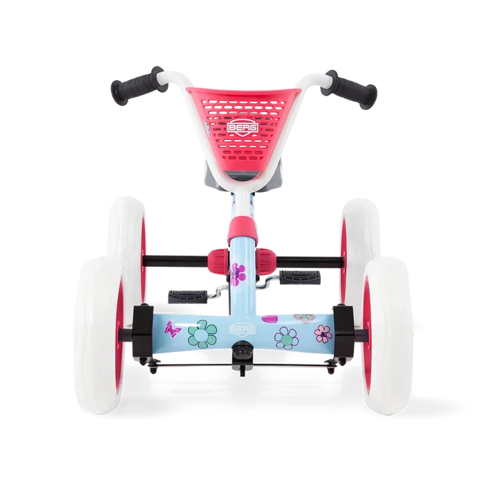 Front view of a light blue pedal go-kart with floral decals, a pink storage basket, and white wheels.