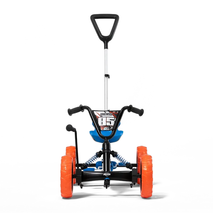 Front view of a black pedal go-kart with chunky orange tires, blue accents, and a tall vertical push bar.