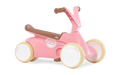 Pastel pink four-wheeled toddler ride-on with brown seat and grips, cream tires, and white number 85 on the side.