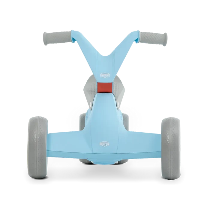 Front view of a light blue four-wheeled ride-on toy with grey textured wheels and grey handlebar grips.