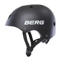 Matte black skate-style helmet with white BERG logo on side, air vents, and black adjustable chin straps.