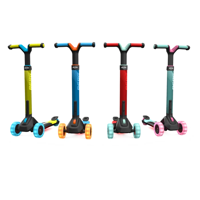 Four three-wheeled scooters in lime, blue, red, and teal colors with black frames and matching light-up wheels.