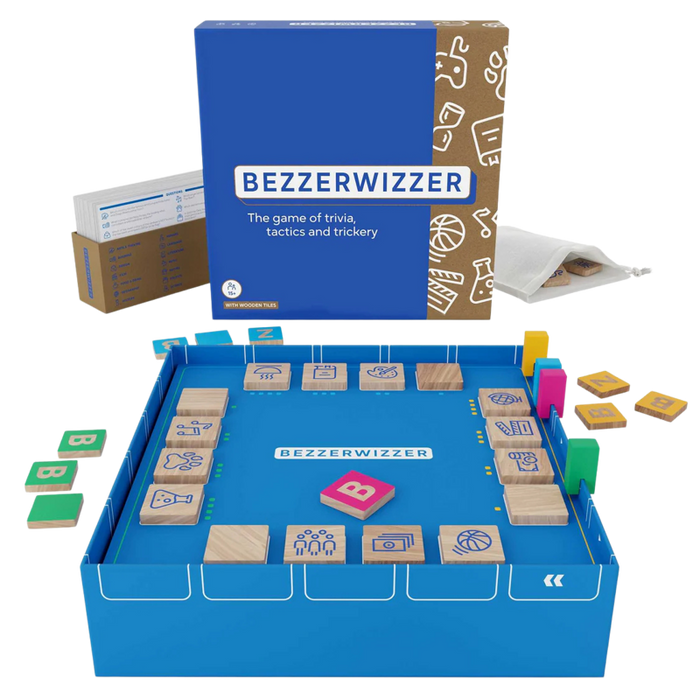 Blue and brown Bezzerwizzer game box with set-up board, wooden icon tiles, and question cards.